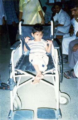 Wheelchair distribution camp for disabled persons